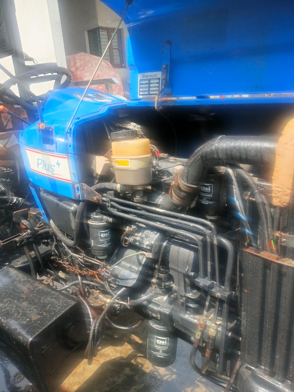 New Holland Plus